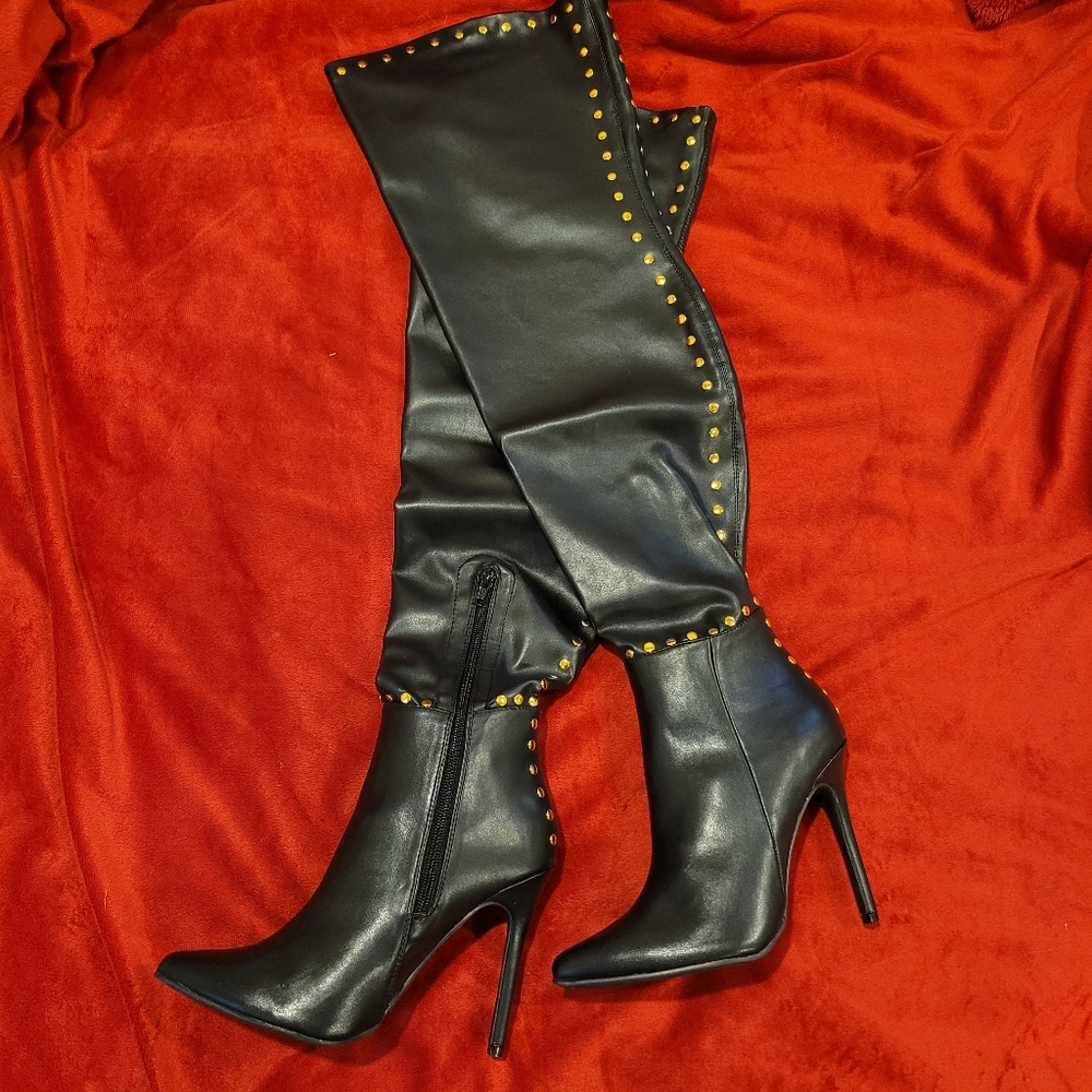 Thigh high black boots